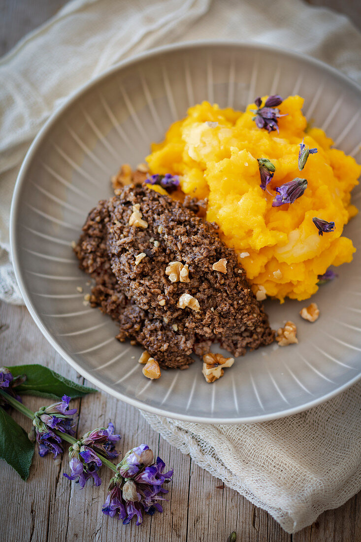 Haggis with mushed pumpkin and turnips (Scotland)