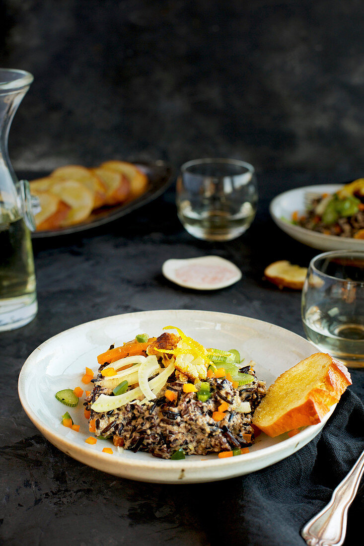 Vegtable Wild Rice with Roasted Cauliflower Citrus Pesto served with wine and bread