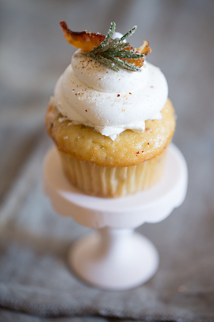 A savoury cupcake with cream cheese, rosemary and bacon