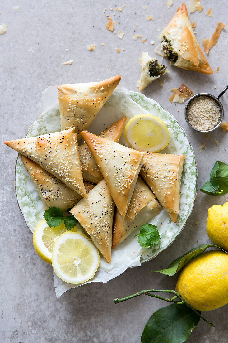 Spanakopita triangles or spinach pie is a Greek savoury pastry