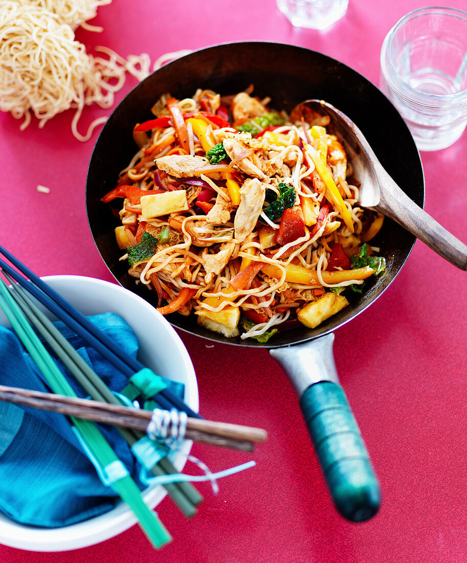 Sweet and sour chicken with noodles and vegetables (Asia)