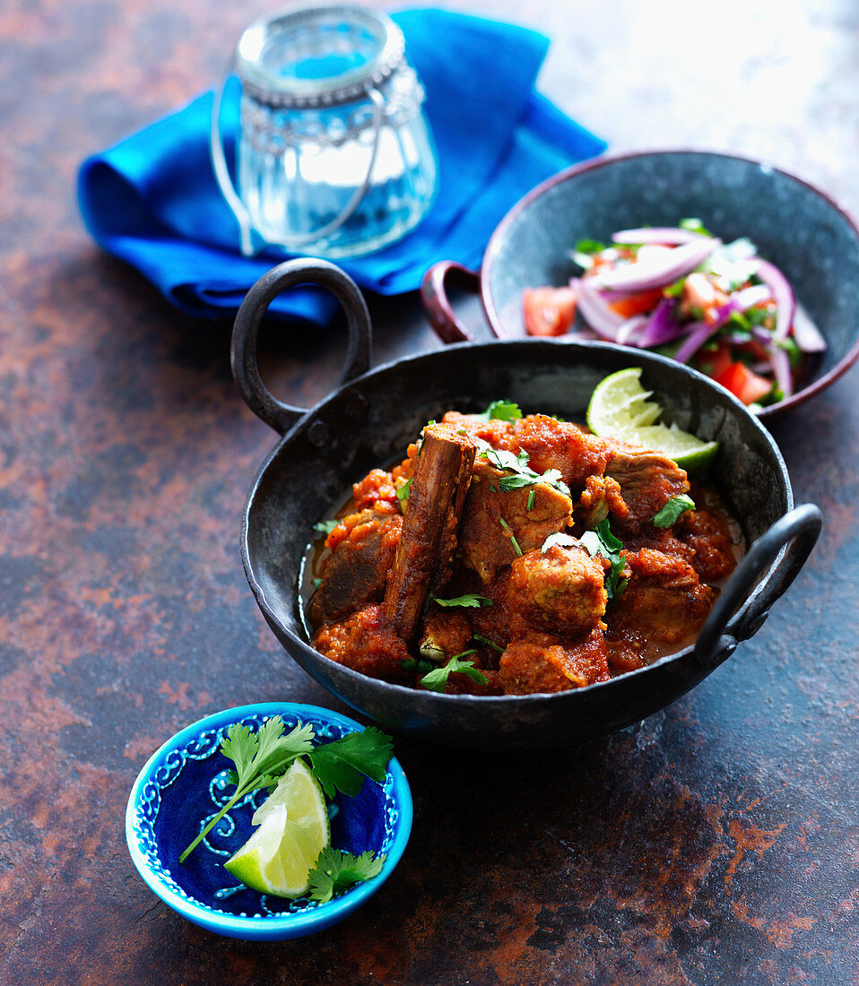 Vindaloo curry with lime and coriander leaves (India)