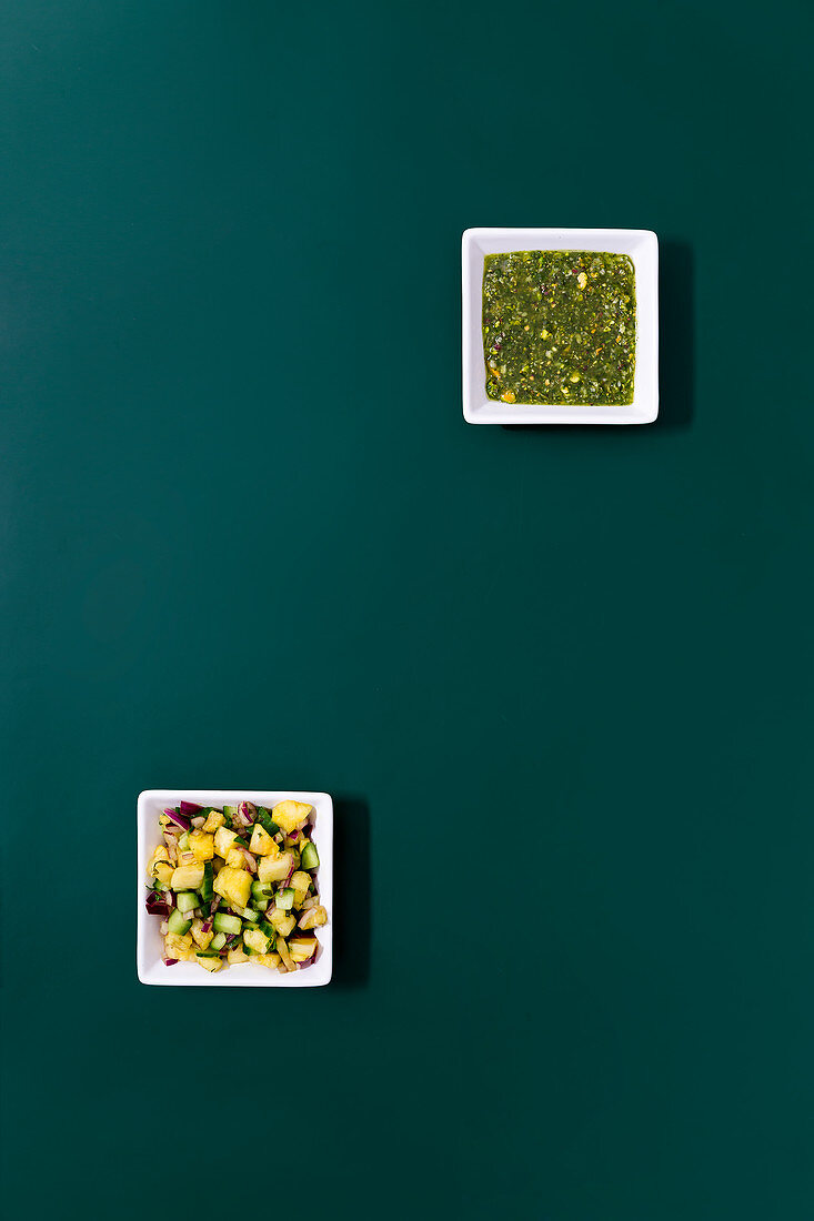 A cucumber and pineapple relish and sweet pistachio pesto