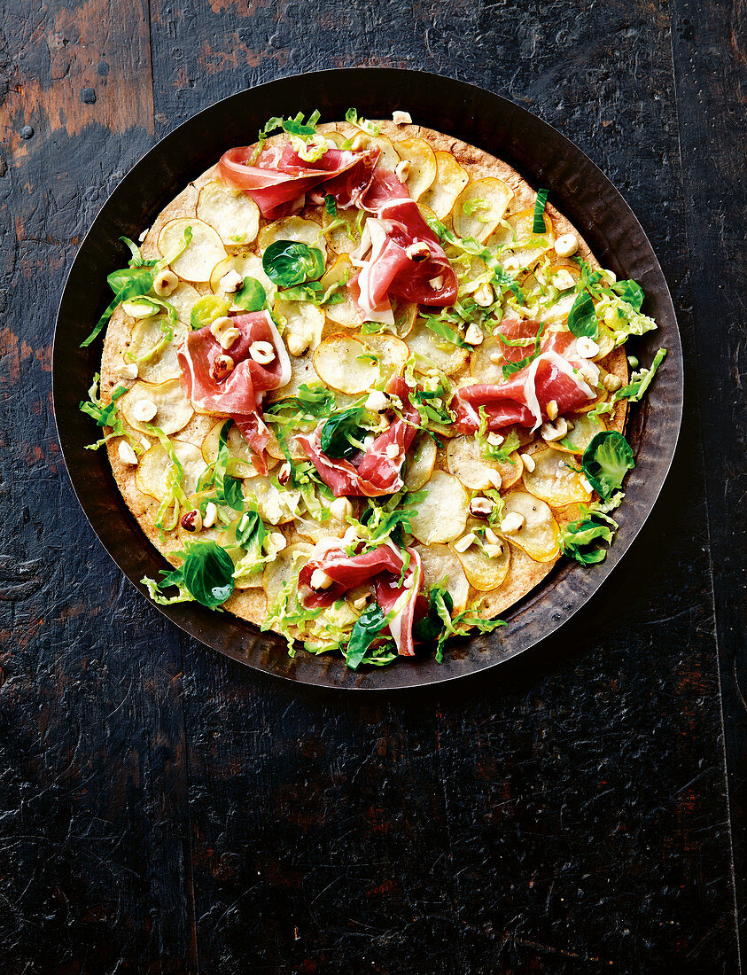 Potato, prosciutto and brussels sprouts pizza