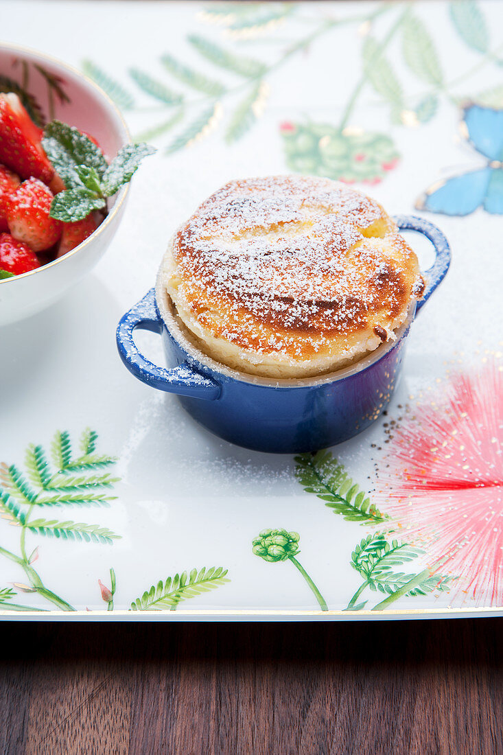 Grilled quark soufflé with strawberries and macadamia nuts