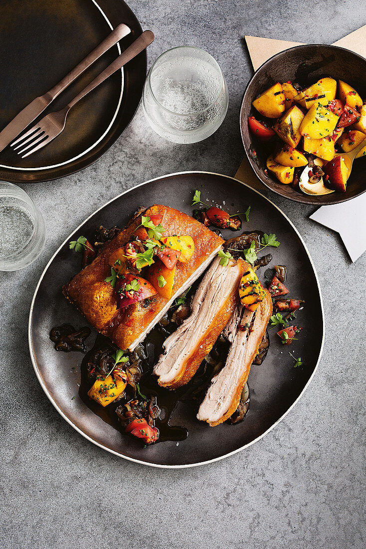 Crispy pork belly with peach salsa