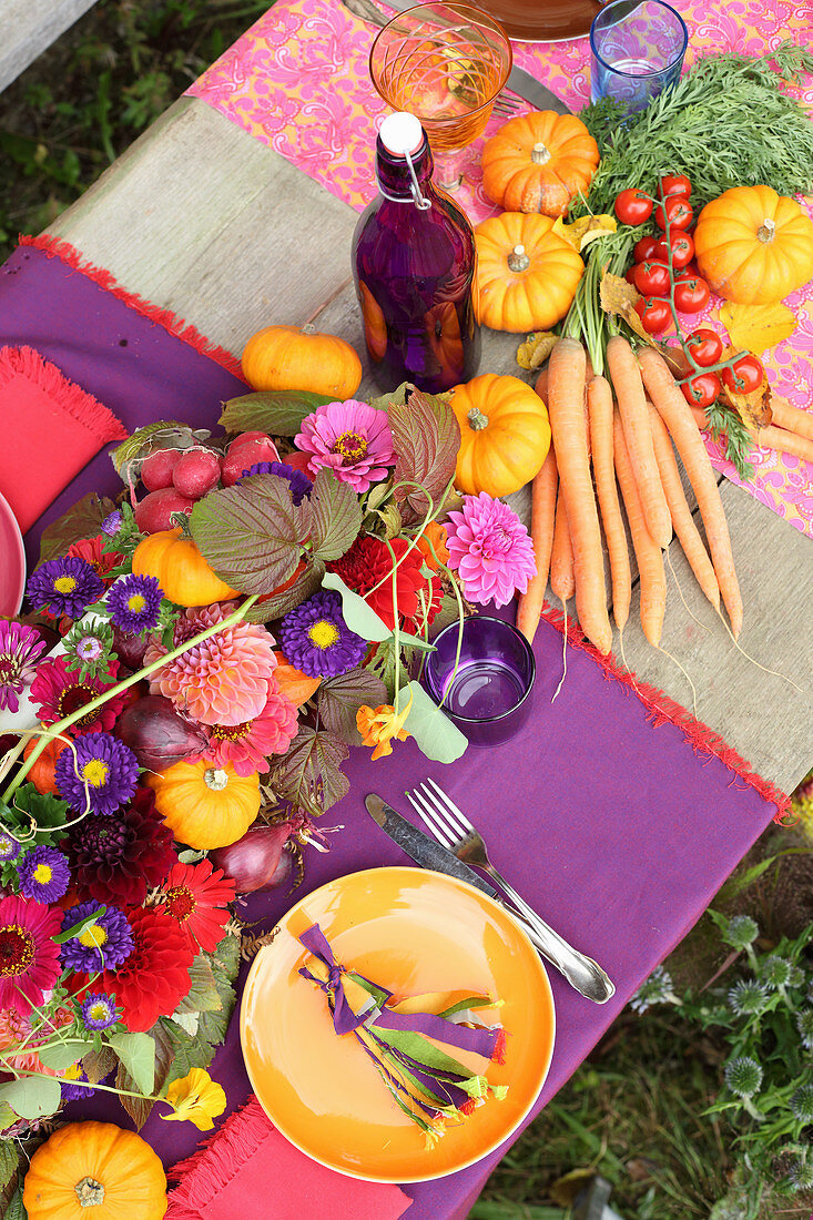 Table set for harvest festival in bright colours