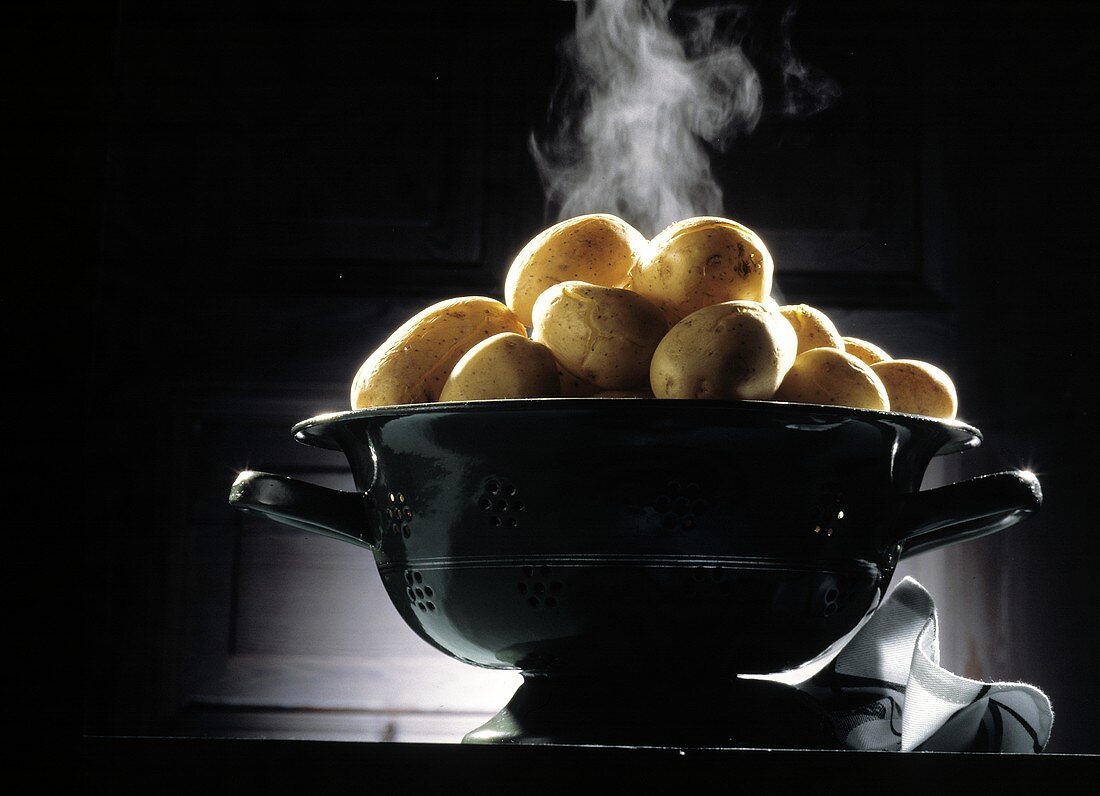 Steaming Boiled Potatoes in a Strainer