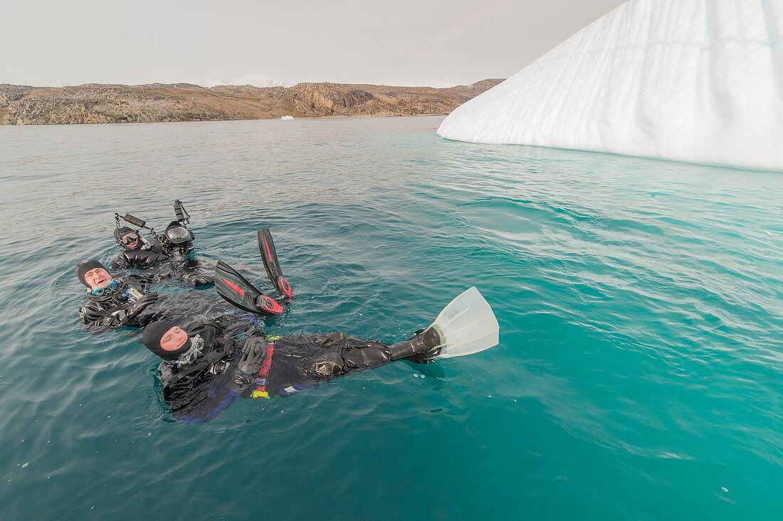 SCUBA diving next to iceberg in Eastern Greenland