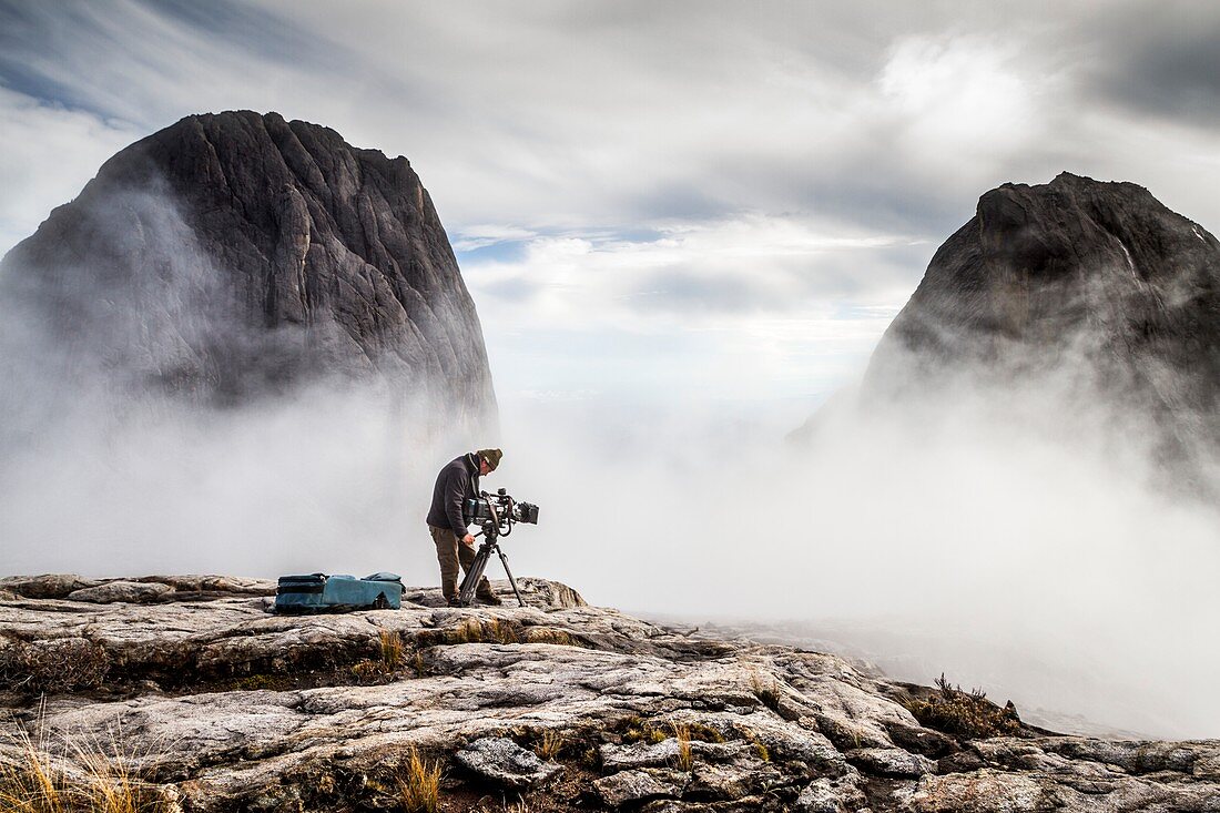 Cameraman filming, Mount Kinabalu, Borneo