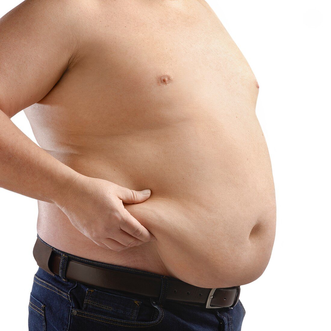 Topless overweight man holding body fat