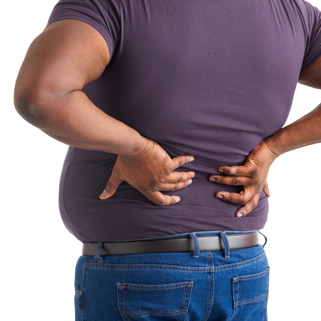 Overweight man with his hands on his back