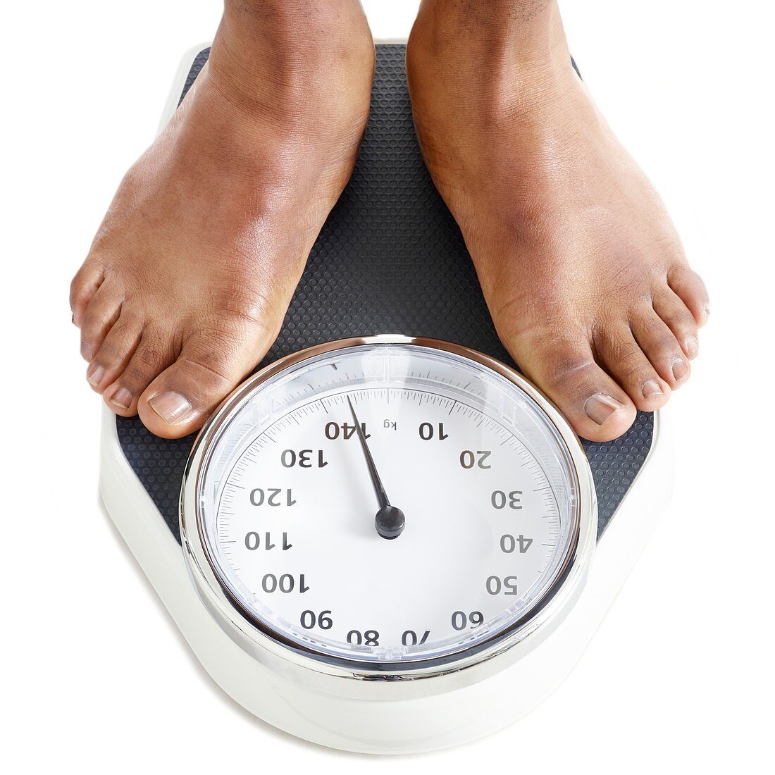 Man standing on weighing scales