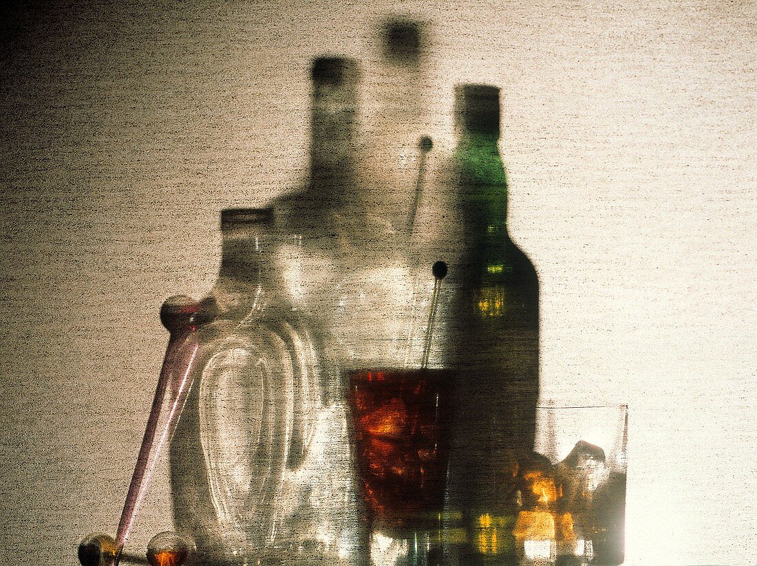 Still Life with Spirits in Glasses Beside a Wall with Shadows