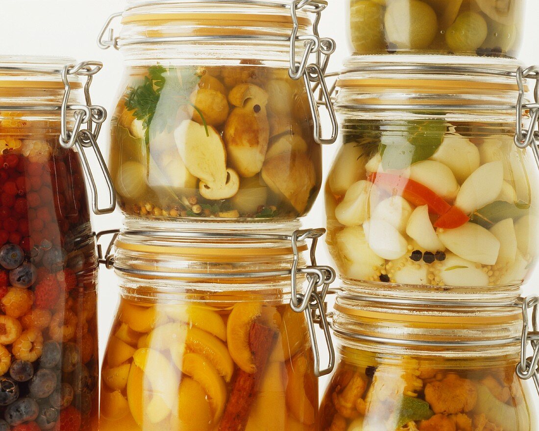 Assorted Preserving Jars with Fruit and Vegetables; Stacked