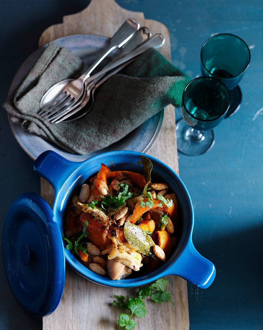 Chicken tagine with carrots, pumpkin and almonds