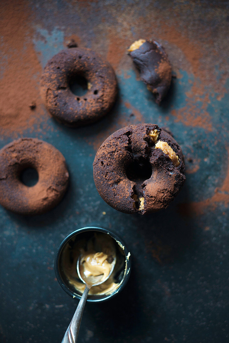 Vegan chocolate donuts filled with peanut butter