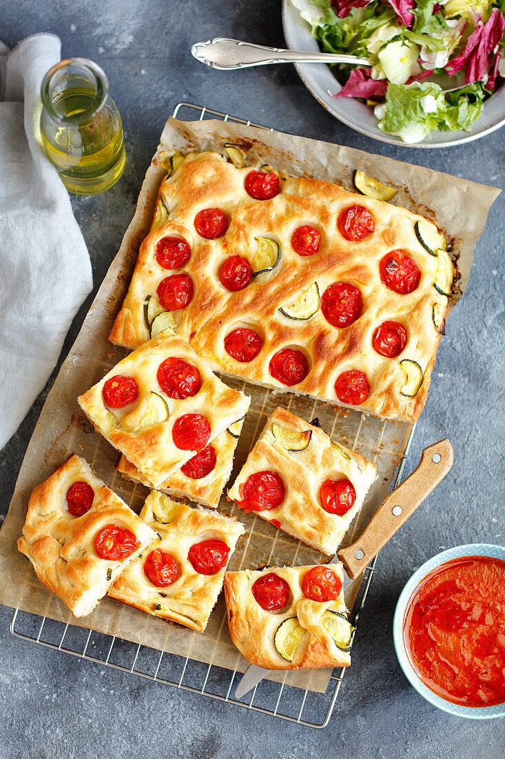 Focaccia with cherry tomatoes and courgette