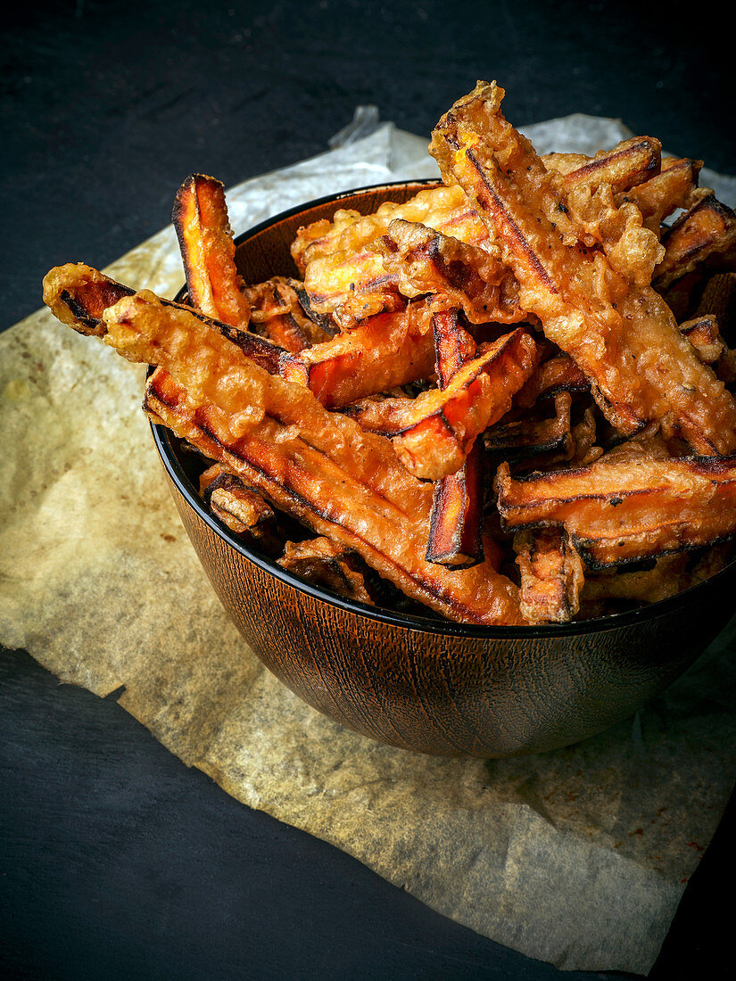 Sweet potato chips in a wooden bowl