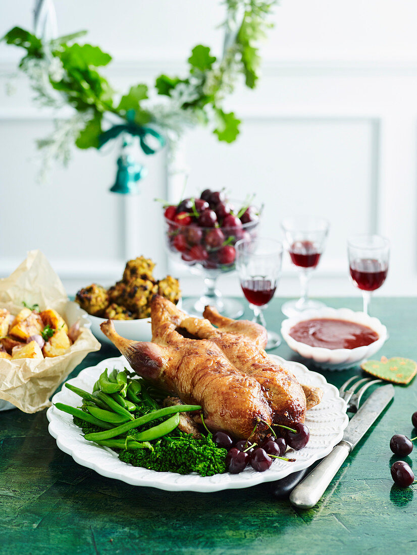 Classic Roast Duck with duck fat roast potatoes and steamed greens