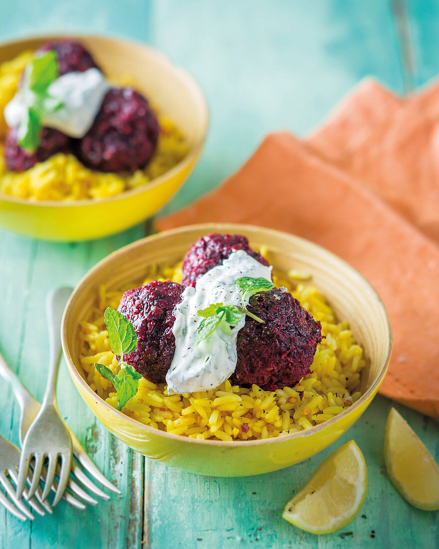 Beetroot lentil balls on turmeric rice