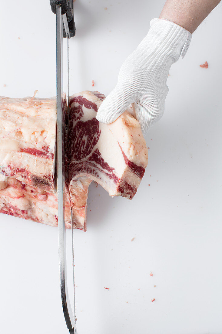 Entrecote being cut