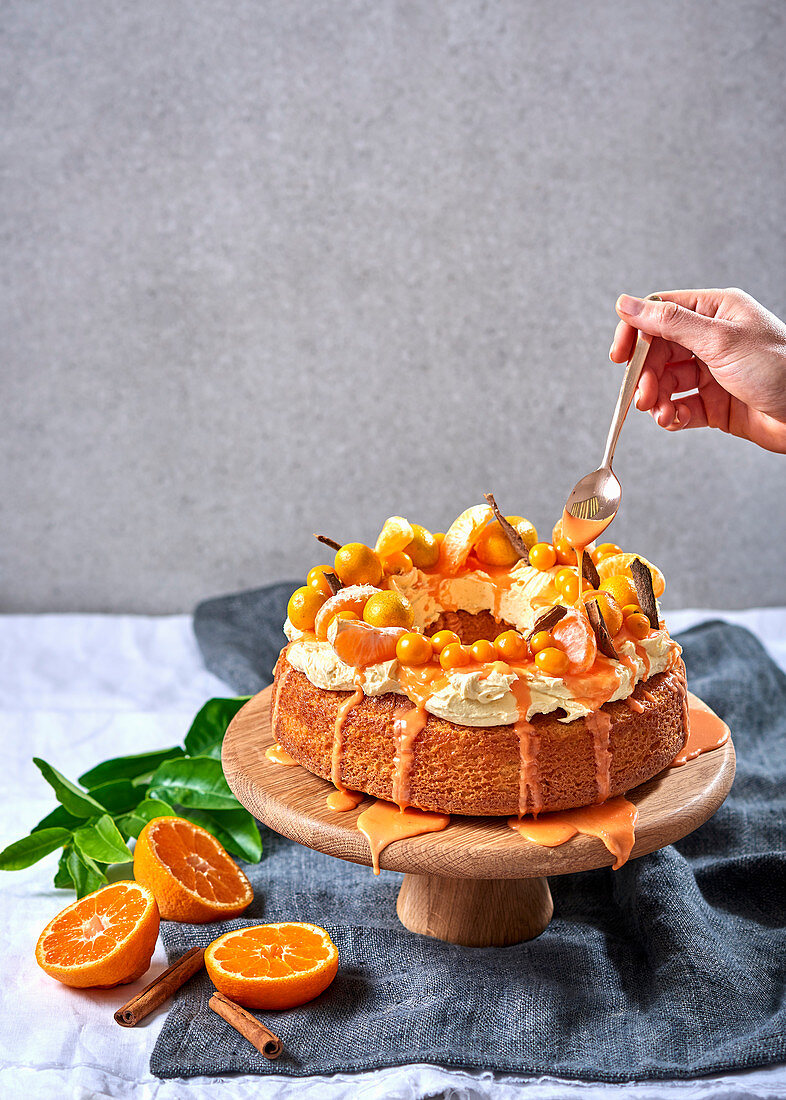 Rum baba with gooseberries and kumquats