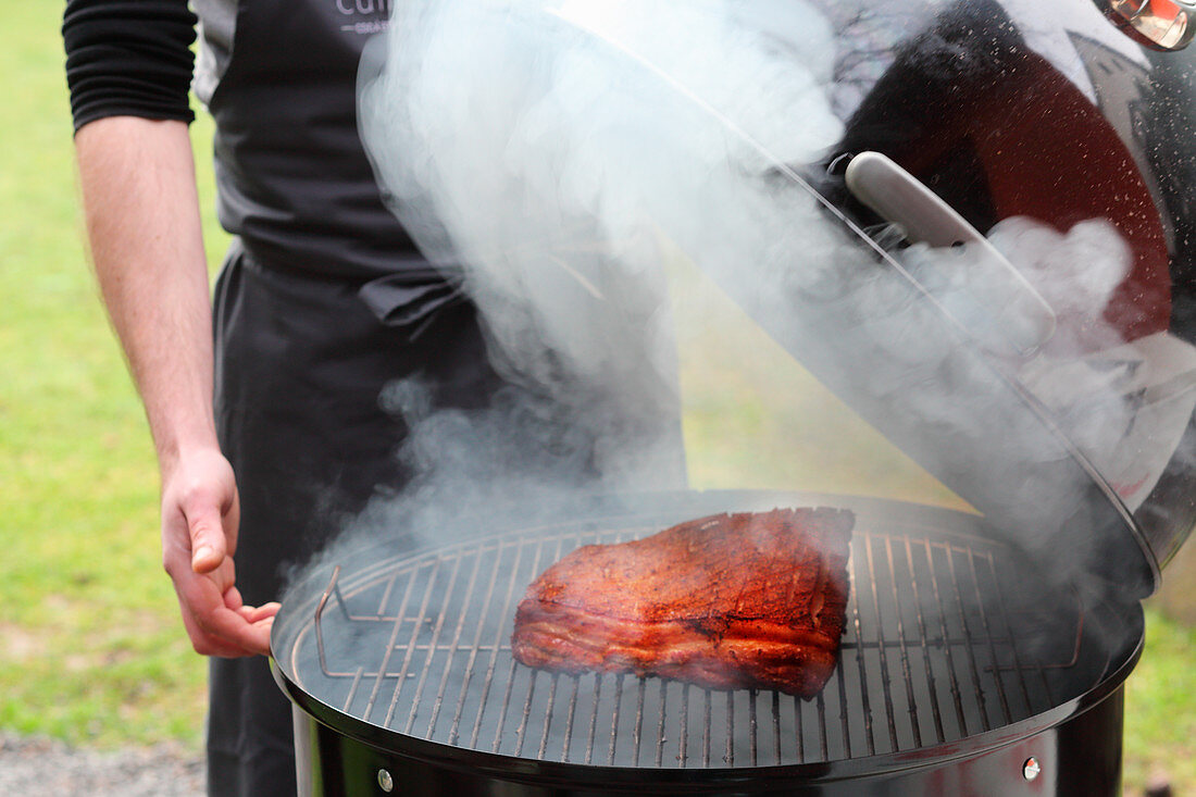 Pork belly being smoked