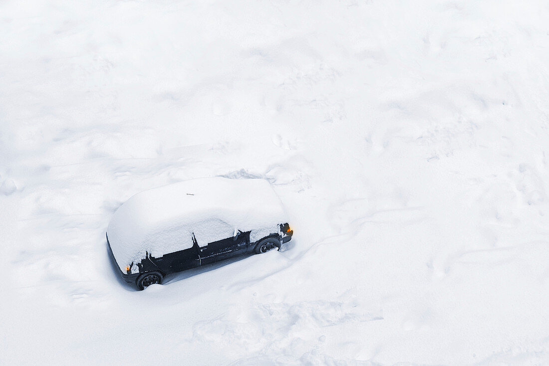 Car trapped in deep snow