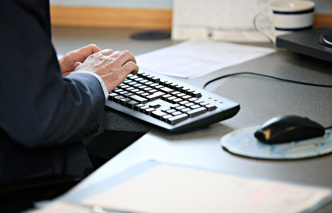 Office worker using keyboard