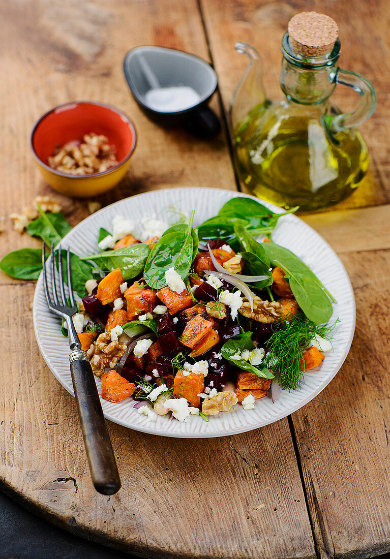 Sweet potato salad with vegetables and goat's cheese