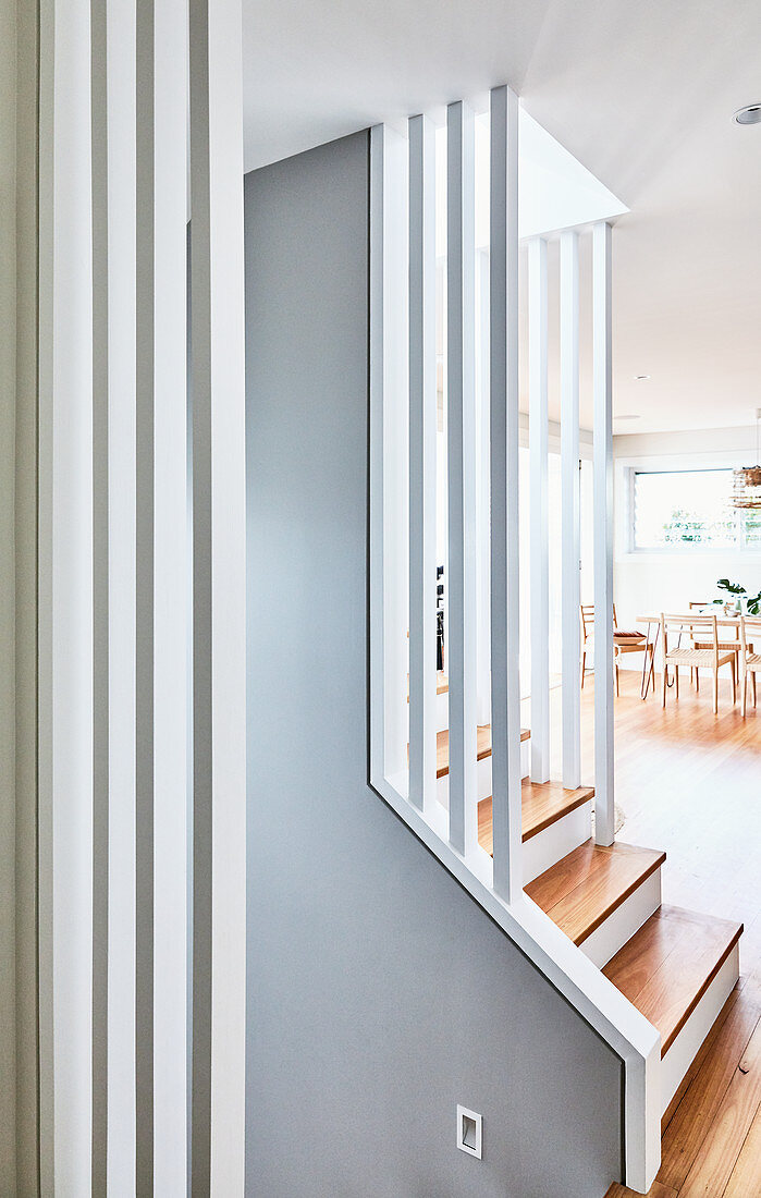 Foot of staircase in open-plan interior