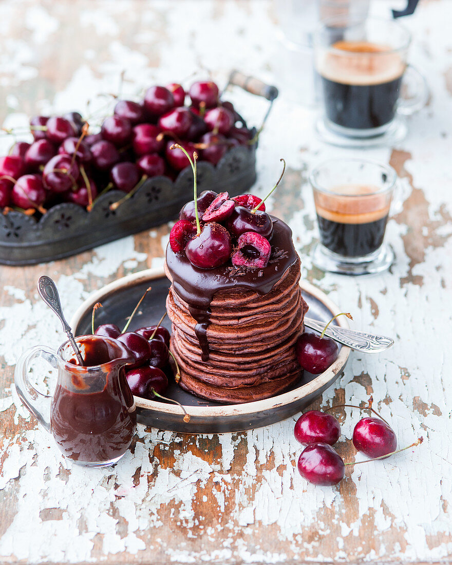 Chocolate pancakes with cherries