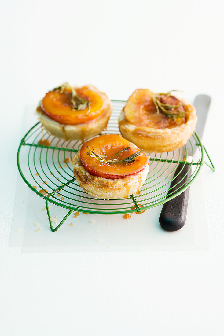 Peach tarte tatin with rosemary