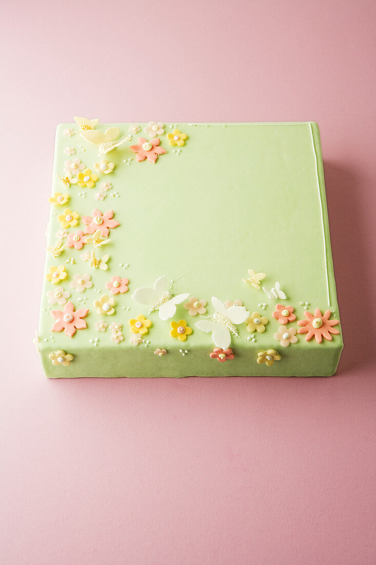 A cake decorated with sugar flowers