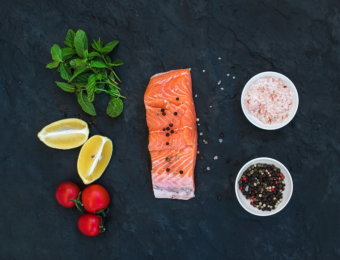 Raw salmon filet, lemon, cherry tomatoes, fresh mint and spices