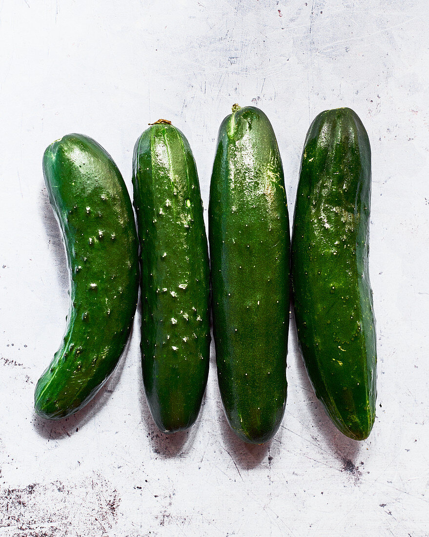 Four cucumbers (seen from above)