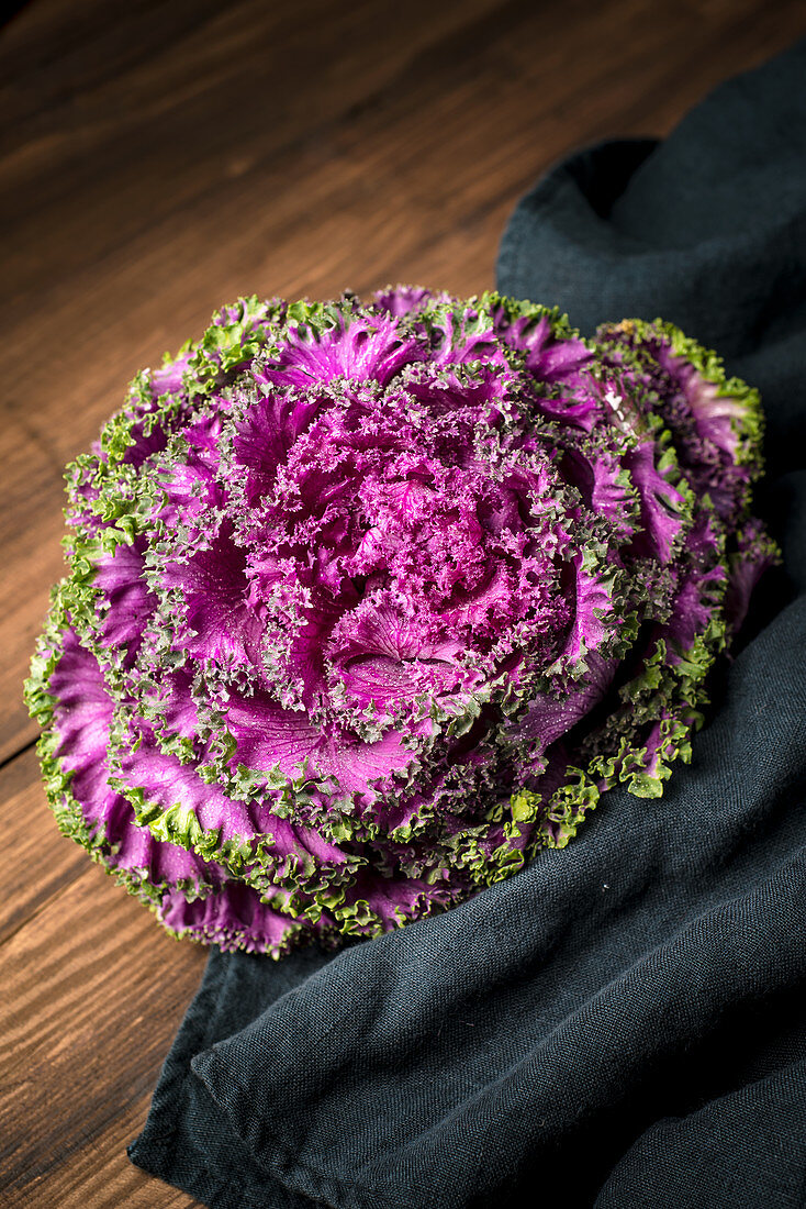 Purple cabbage on a wooden table