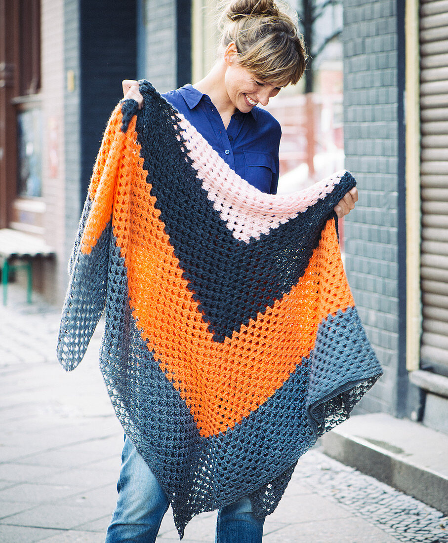 A woman with a crocheted shawl