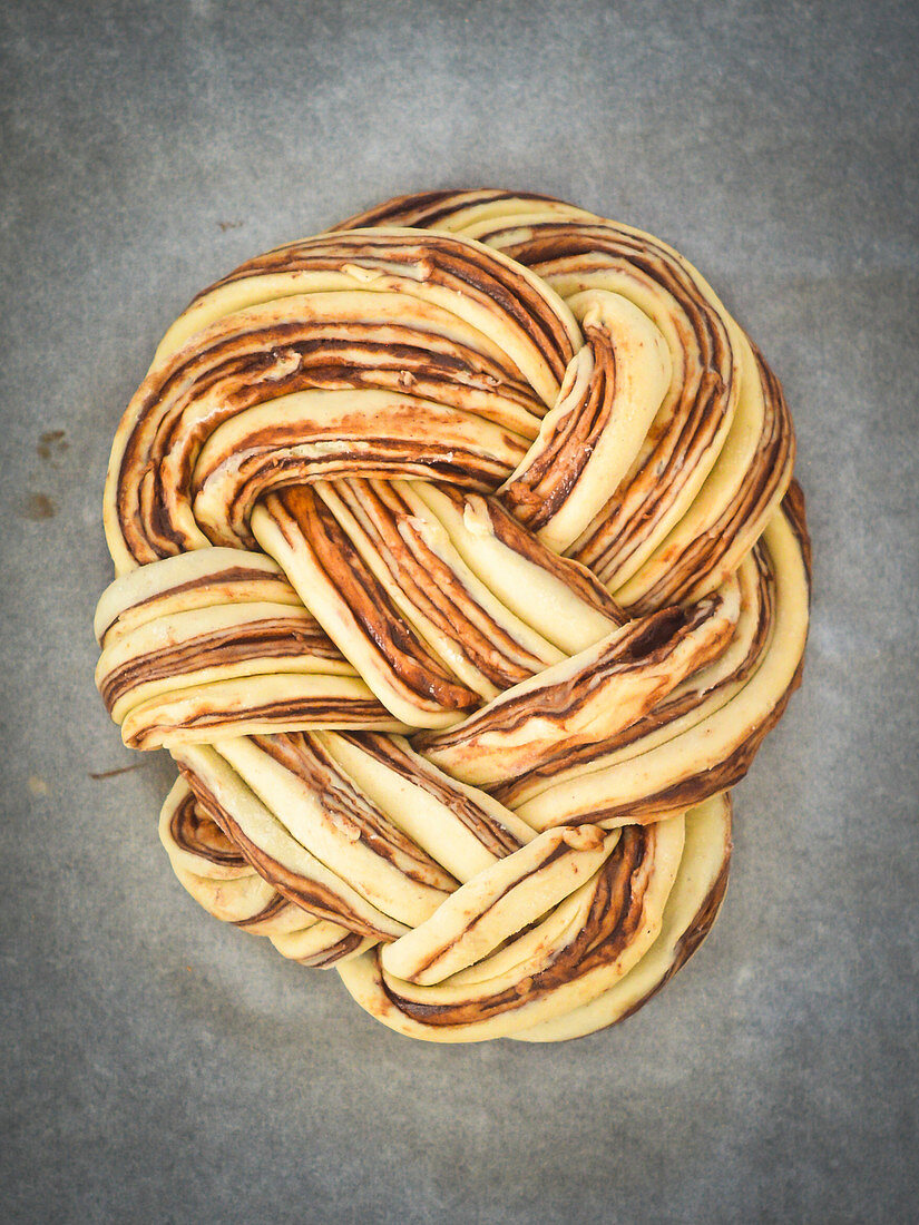 Plaited bread with chocolate and cinnamon, unbaked