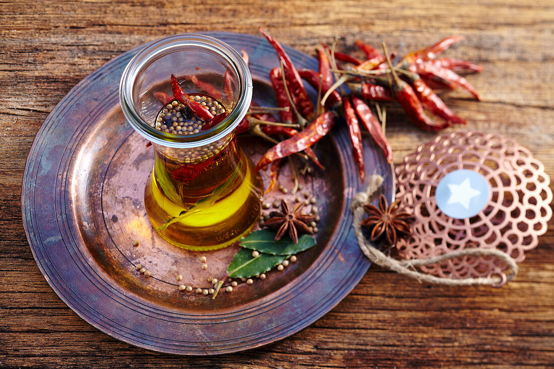 Homemade oriental spice oil in a glass