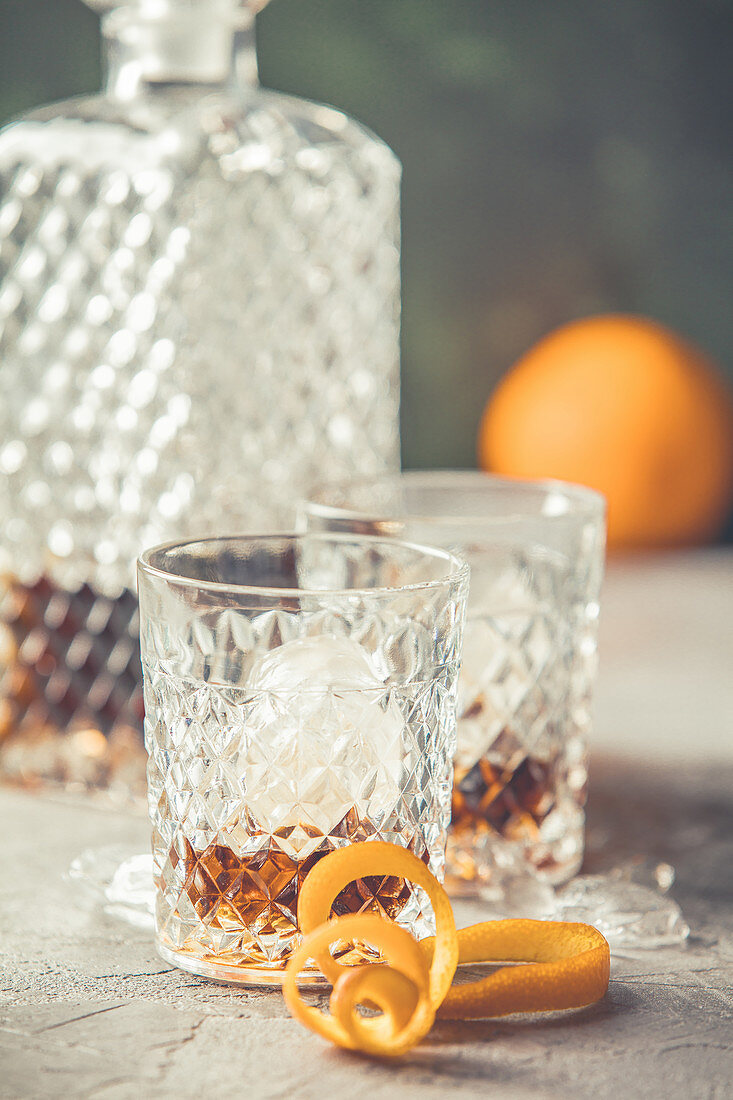 Two glasses with Borbon and a crystal decanter