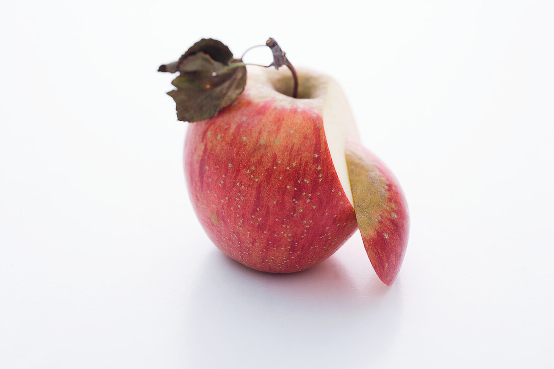 A Magenta apple, sliced