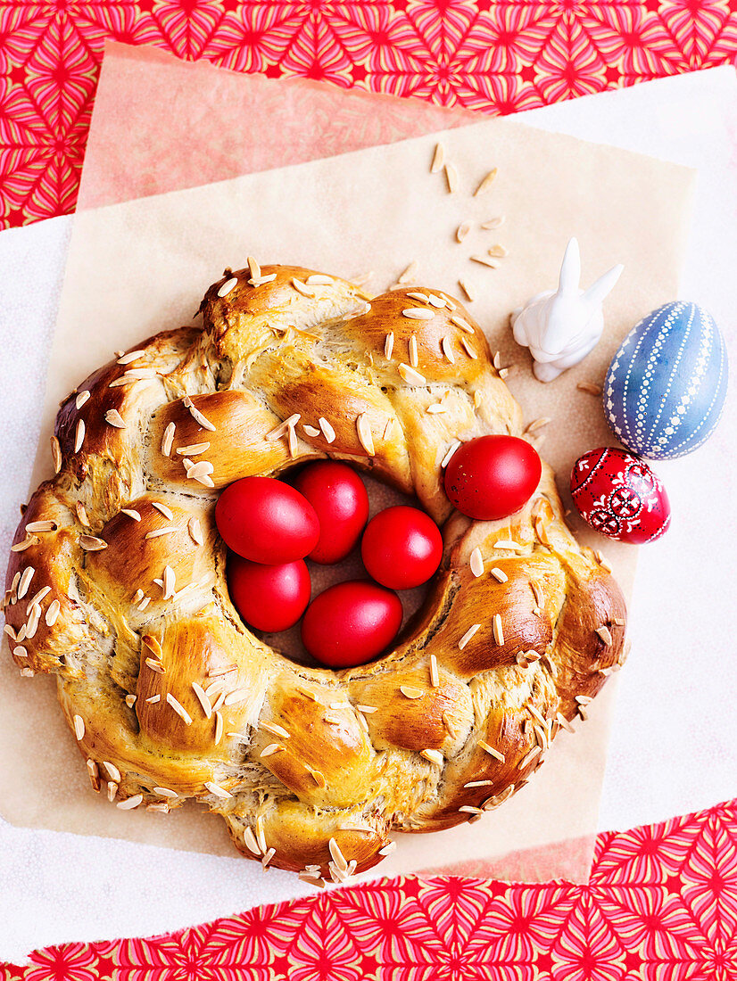 Greek Easter bread with red hard boiled eggs