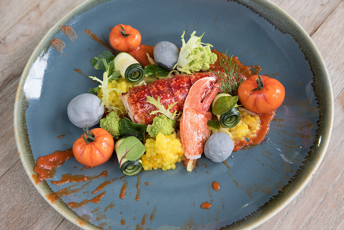 Plate of lobster salad with lobster meat and vegetables