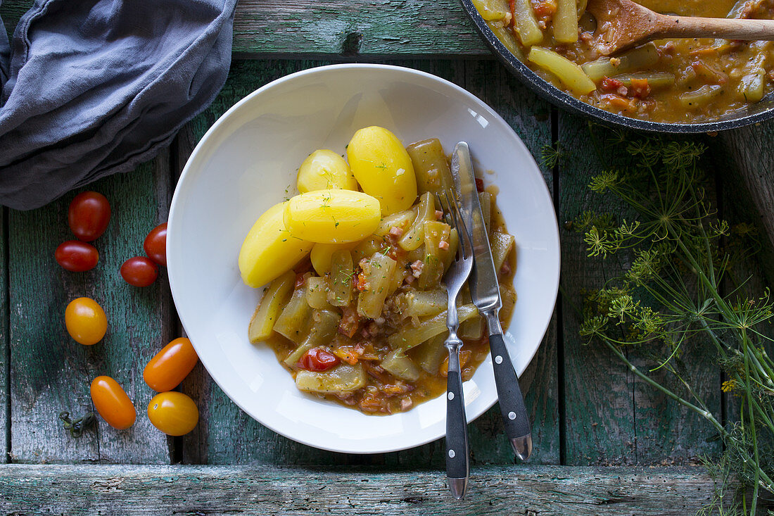 Cucumbers with cocktail tomatoes, boiled potatoes and cucumber dill