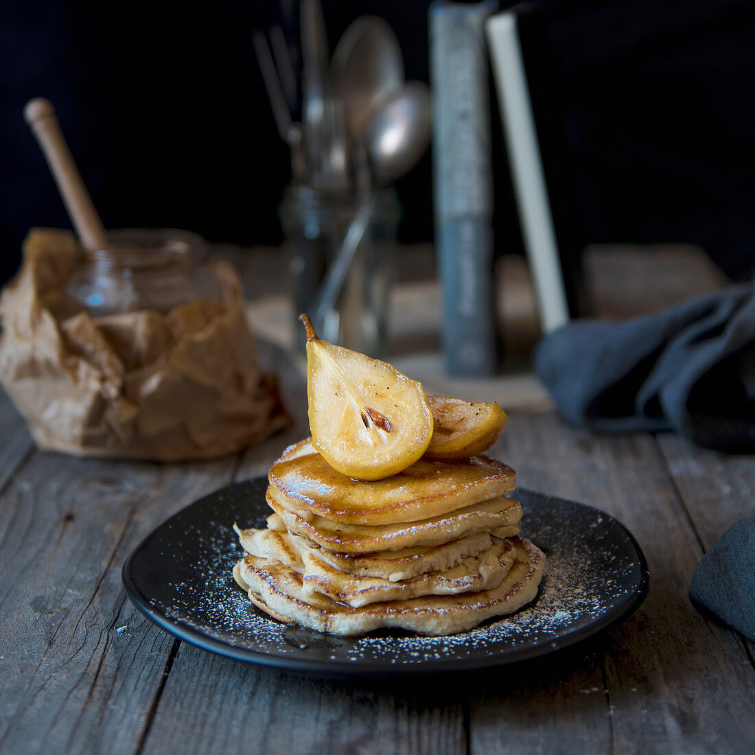 Pancakes with caramelised pears and honey