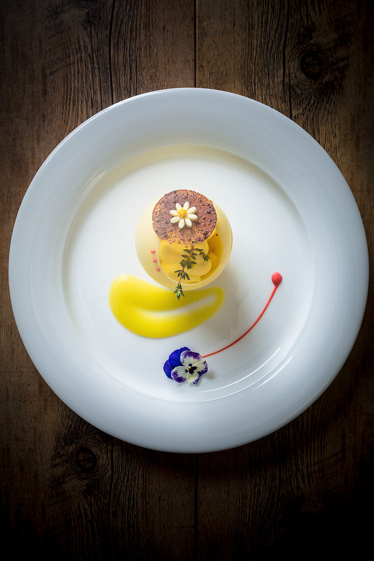 Blancmange with thyme and a horned violet