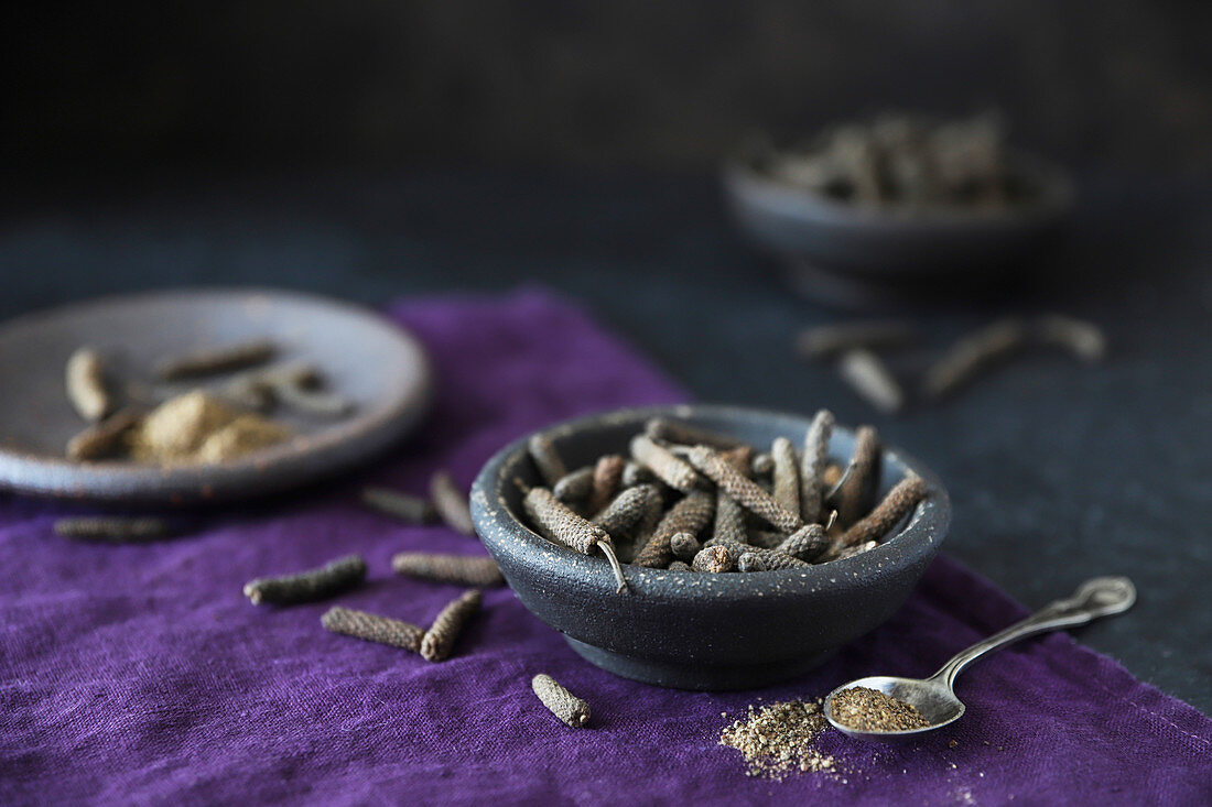 Long pepper in grey bowls