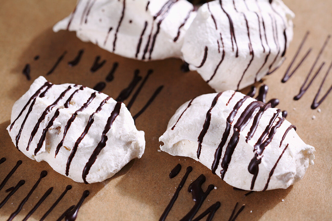 Meringues with chocolate stripes